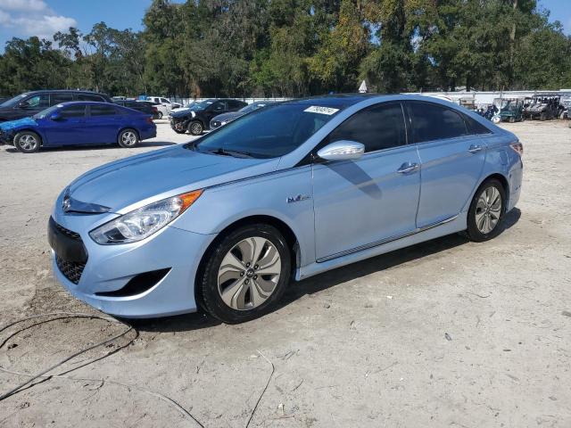 HYUNDAI SONATA HYB 2014 with VIN KMHEC4A40EA104359 - Photo from auction