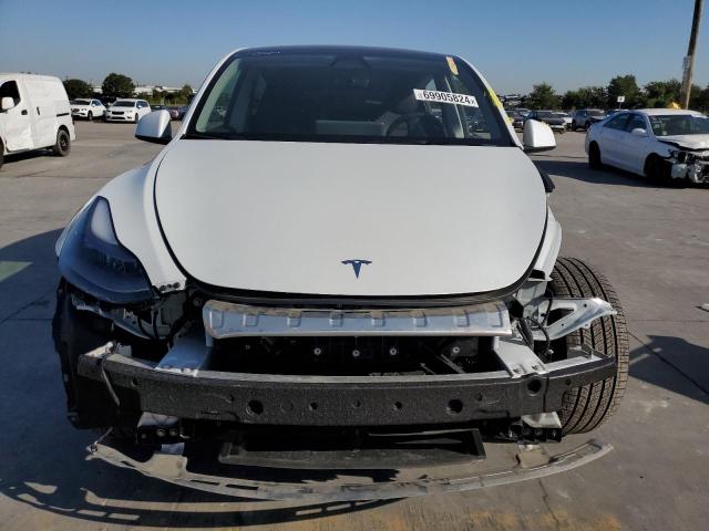 Photo 5 from auction – 2023 TESLA MODEL Y with VIN 7SAYGDEE8PA208732