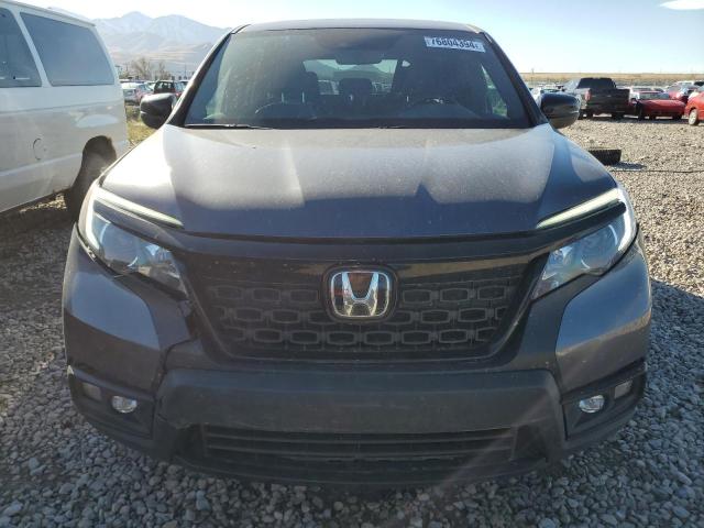 Photo 5 from auction – 2021 HONDA PASSPORT E with VIN 5FNYF8H59MB023980