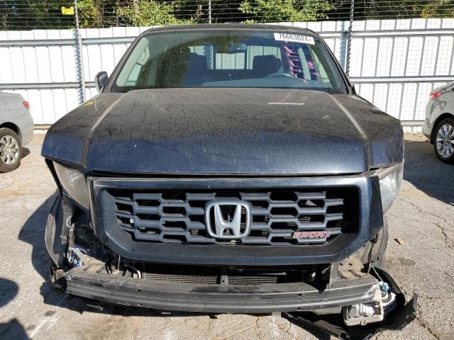 Снимка 5 от търг – 2014 HONDA RIDGELINE с VIN 5FPYK1F75EB012197