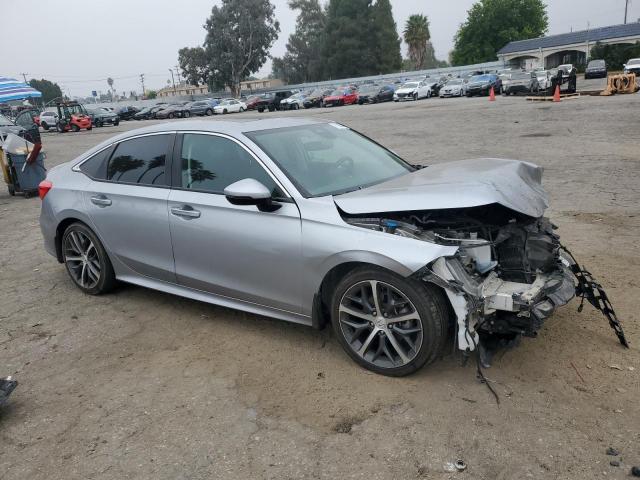 Photo 4 from auction – 2023 HONDA CIVIC TOUR with VIN 2HGFE1F97PH306241