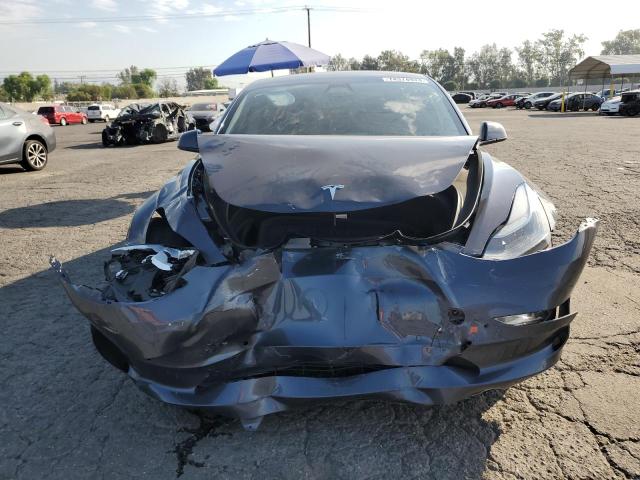 Photo 5 from auction – 2022 TESLA MODEL 3 with VIN 5YJ3E1EB5NF221746