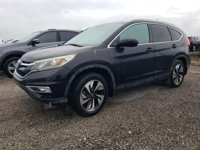 HONDA CR-V TOURI 2016 with VIN 5J6RM3H94GL007925 - Photo from auction