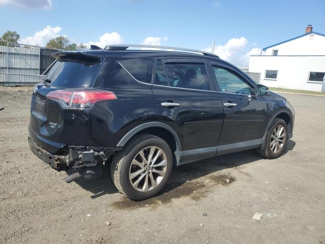 Photo 3 from auction – 2017 TOYOTA RAV4 LIMIT with VIN 2T3DFREV7HW584851