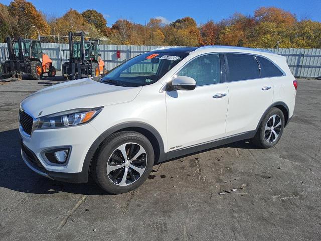 KIA SORENTO EX 2016 with VIN 5XYPHDA58GG158986 - Photo from auction