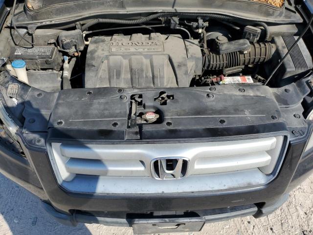 Photo 12 from auction – 2006 HONDA PILOT EX with VIN 2HKYF18706H533664