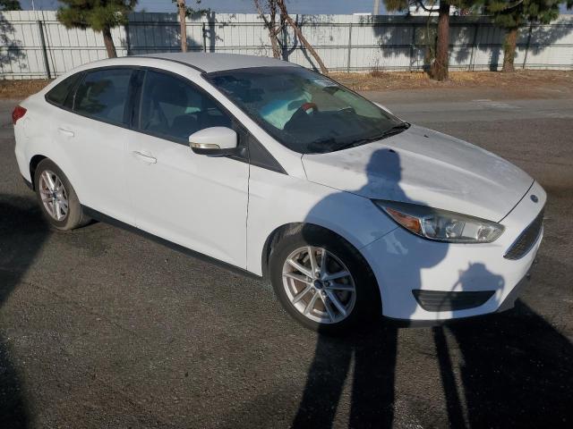 Photo 4 from auction – 2015 FORD FOCUS SE with VIN 1FADP3F2XFL335335