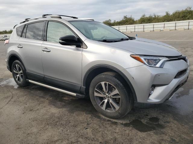 Photo 4 from auction – 2016 TOYOTA RAV4 XLE with VIN 2T3WFREVXGW303617