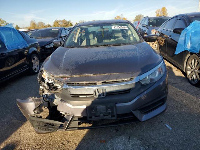 Photo 5 from auction – 2018 HONDA CIVIC EX with VIN 2HGFC2F75JH595704