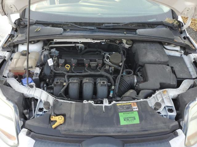 Photo 11 from auction – 2014 FORD FOCUS SE with VIN 1FADP3F20EL203800