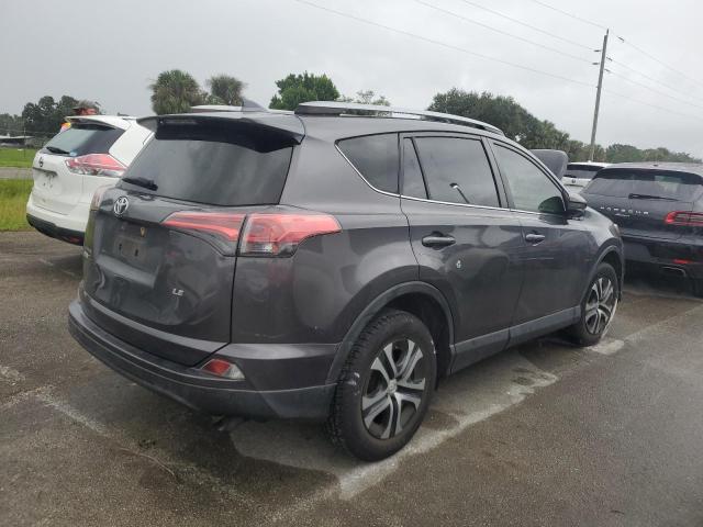 Photo 3 from auction – 2018 TOYOTA RAV4 LE with VIN JTMZFREV4JJ157282