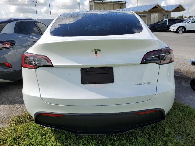 Photo 6 from auction – 2024 TESLA MODEL Y with VIN 7SAYGDEE4RA261012