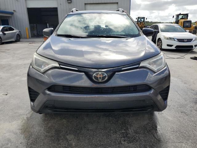 Photo 5 from auction – 2018 TOYOTA RAV4 LE with VIN 2T3ZFREV0JW491665