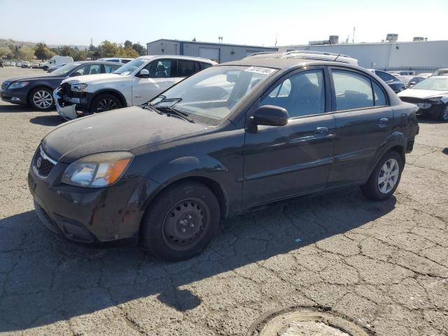 KIA RIO BASE 2011 with VIN KNADH4A31B6932845 - Photo from auction