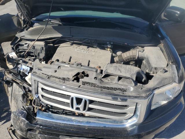 Photo 11 from auction – 2014 HONDA RIDGELINE with VIN 5FPYK1F52EB005562