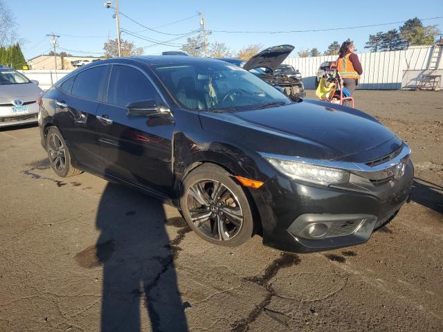 Photo 4 from auction – 2016 HONDA CIVIC TOUR with VIN 2HGFC1F98GH648478