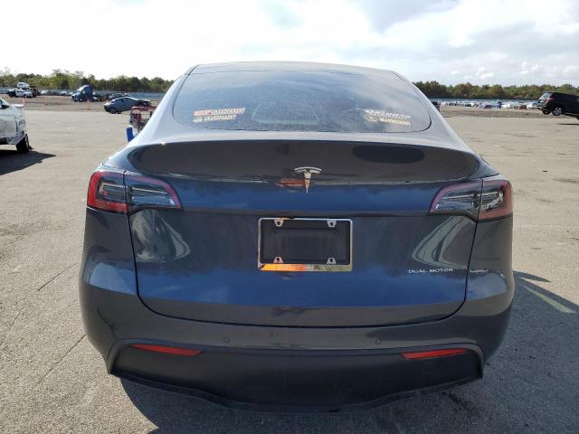 Photo 6 from auction – 2022 TESLA MODEL Y with VIN 7SAYGDEE2NF385227