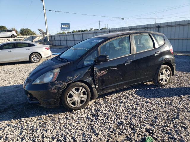 HONDA FIT 2011 with VIN JHMGE8H33BS002828 - Photo from auction