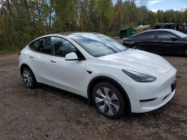 Photo 4 from auction – 2023 TESLA MODEL Y with VIN LRWYGDFD5PC967631