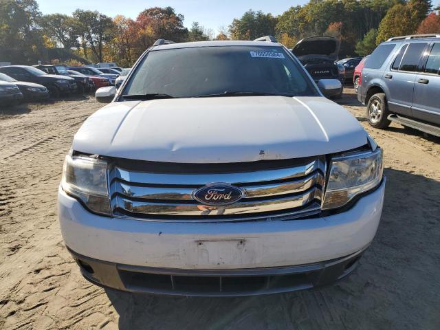 Photo 5 from auction – 2008 FORD TAURUS X S with VIN 1FMDK05W88GA02036