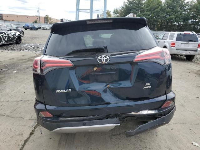 Photo 6 from auction – 2018 TOYOTA RAV4 SE with VIN JTMJFREV9JJ190968