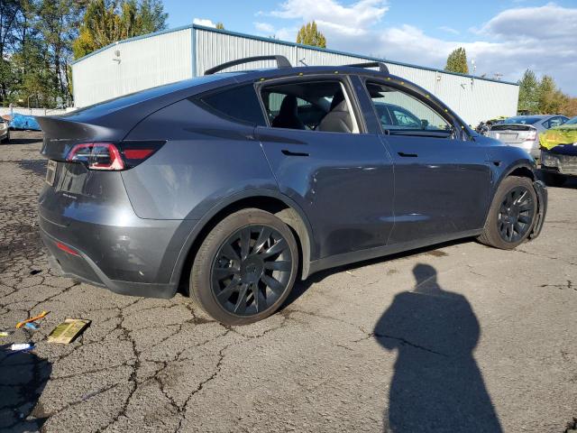Photo 3 from auction – 2023 TESLA MODEL Y with VIN 7SAYGDEEXPF598767