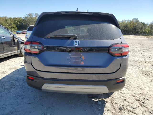 Photo 6 from auction – 2023 HONDA PILOT EXL with VIN 5FNYG2H56PB010134