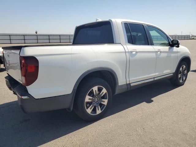 Photo 3 from auction – 2017 HONDA RIDGELINE with VIN 5FPYK3F66HB023328