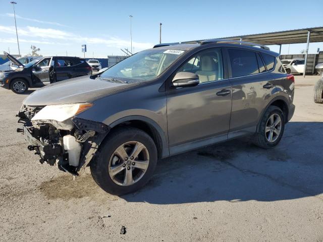 TOYOTA RAV4 XLE 2015 with VIN JTMWFREV4FD050628 - Photo from auction