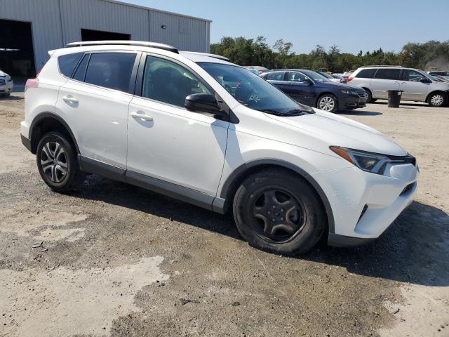 Photo 4 from auction – 2018 TOYOTA RAV4 LE with VIN JTMZFREV2JJ158723