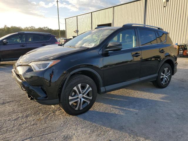 TOYOTA RAV4 LE 2018 with VIN 2T3ZFREV6JW515631 - Photo from auction