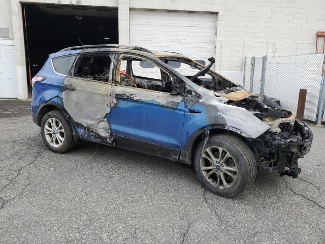 Photo 4 from auction – 2018 FORD ESCAPE SE with VIN 1FMCU9GD5JUB28786
