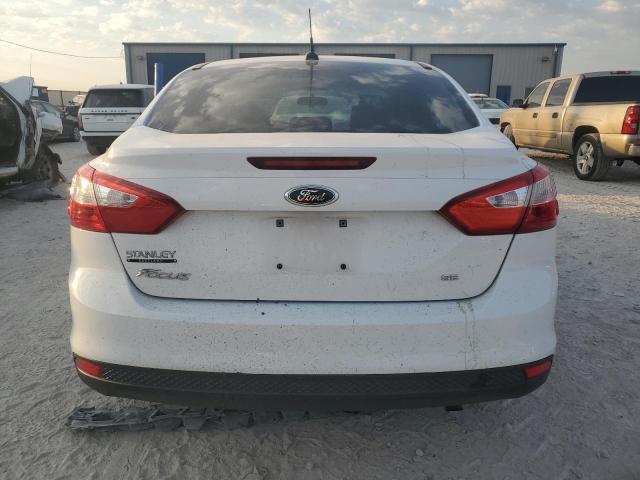 Photo 6 from auction – 2014 FORD FOCUS SE with VIN 1FADP3F24EL455713