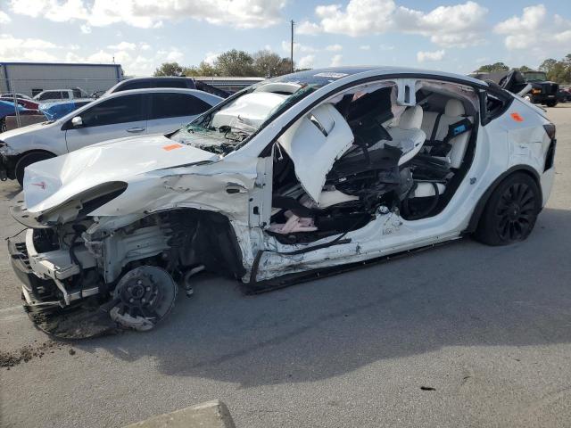 TESLA MODEL Y 2023 with VIN 7SAYGDEE5PA083009 - Photo from auction