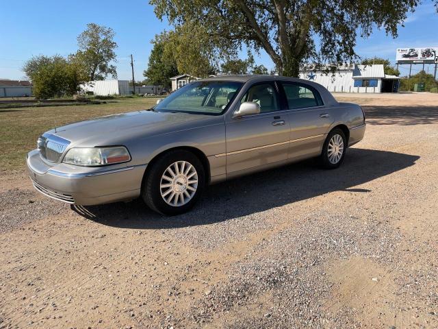 Photo 2 from auction – 2003 LINCOLN TOWN CAR E with VIN 1LNHM81W63Y671926
