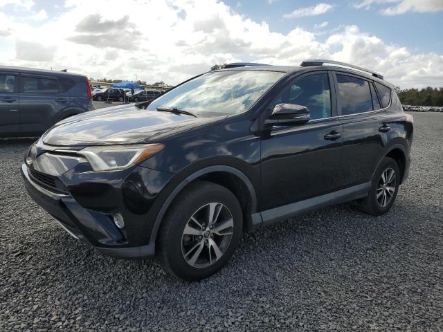 TOYOTA RAV4 XLE 2017 with VIN 2T3WFREV3HW383571 - Photo from auction
