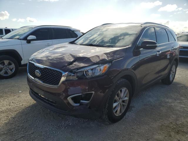 KIA SORENTO LX 2018 with VIN 5XYPG4A33JG377038 - Photo from auction