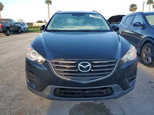 Photo 5 from auction – 2016 MAZDA CX-5 SPORT with VIN JM3KE2BY7G0787104