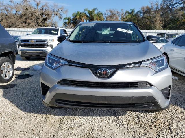 Photo 5 from auction – 2018 TOYOTA RAV4 LE with VIN 2T3ZFREV5JW453395