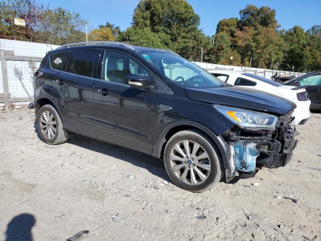 Photo 4 from auction – 2017 FORD ESCAPE TIT with VIN 1FMCU9J90HUB58406