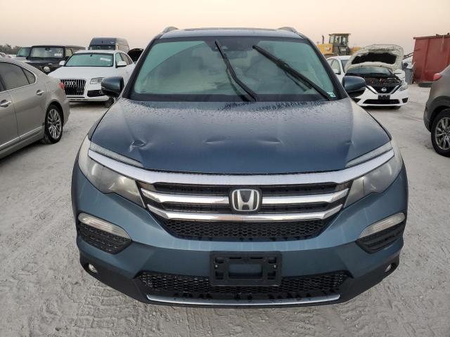 Photo 5 from auction – 2017 HONDA PILOT ELIT with VIN 5FNYF6H08HB062025