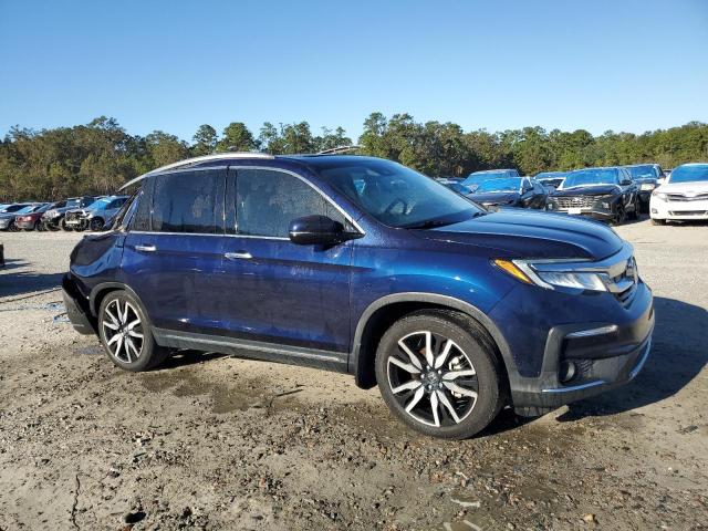 Photo 4 from auction – 2022 HONDA PILOT TOUR with VIN 5FNYF5H94NB004806