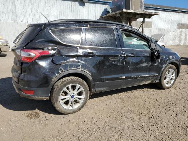 Photo 3 from auction – 2017 FORD ESCAPE SE with VIN 1FMCU9GDXHUC48352