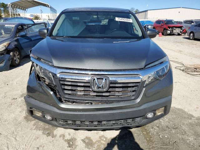 Photo 5 from auction – 2017 HONDA RIDGELINE with VIN 5FPYK2F59HB002037