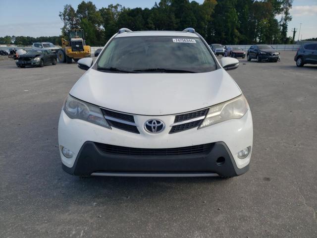 Photo 5 from auction – 2014 TOYOTA RAV4 XLE with VIN JTMWFREV4ED040874