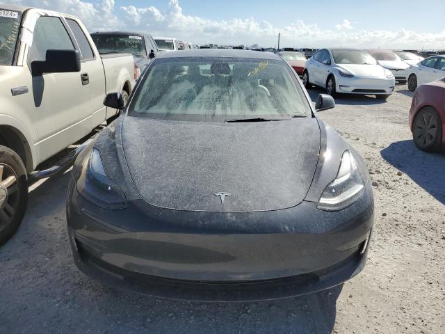 Photo 5 from auction – 2022 TESLA MODEL 3 with VIN 5YJ3E1EB3NF328634