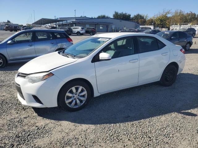 TOYOTA COROLLA L 2015 with VIN 5YFBURHE0FP297982 - Photo from auction