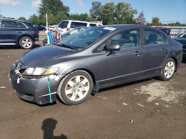 HONDA CIVIC LX 2011 with VIN 19XFA1F59BE024131 - Photo from auction