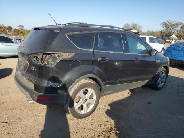 Photo 3 from auction – 2014 FORD ESCAPE SE with VIN 1FMCU0GX0EUB25726