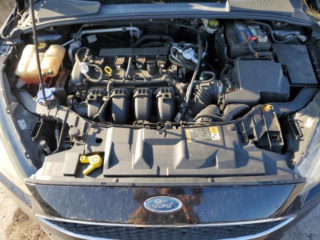 Photo 11 from auction – 2015 FORD FOCUS SE with VIN 1FADP3F21FL340004